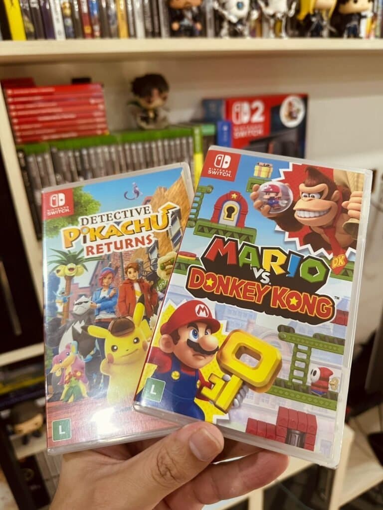 Jogos de Nintendo Switch em frente a uma coleção